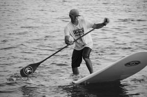 Clinton Johnson paddleboarding