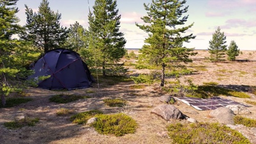 Tent in remote area with PowerFilm Foldable Solar Panel