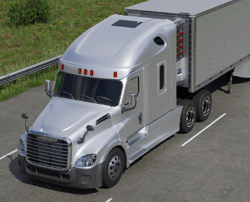 Silver semi-truck with sleeper cab and trailer on road, viewed from above. Solar panel visible on trucks aerodynamic fairing. Grassy surroundings